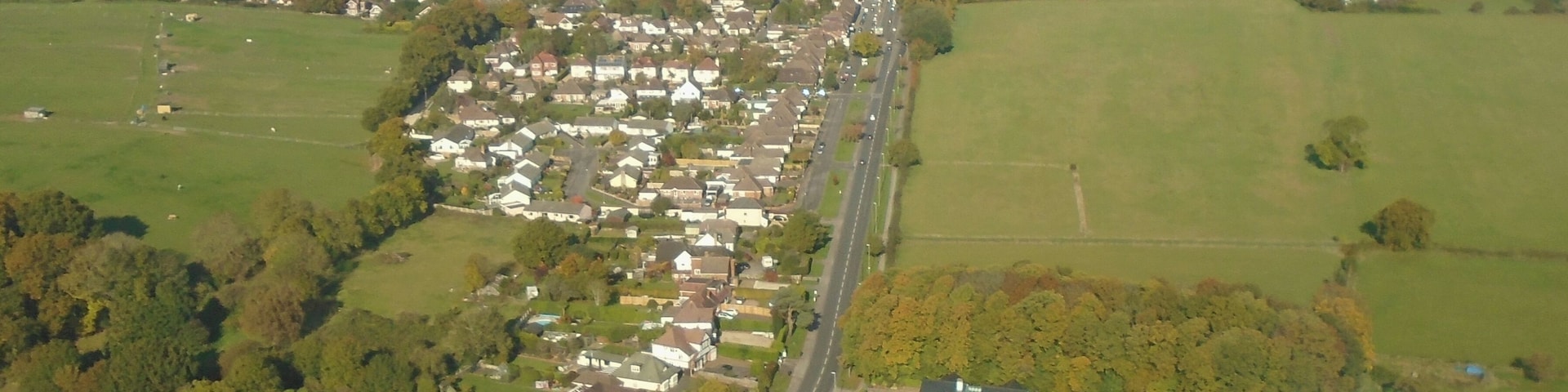 Looking northwards along New Road towards Parley Cross
