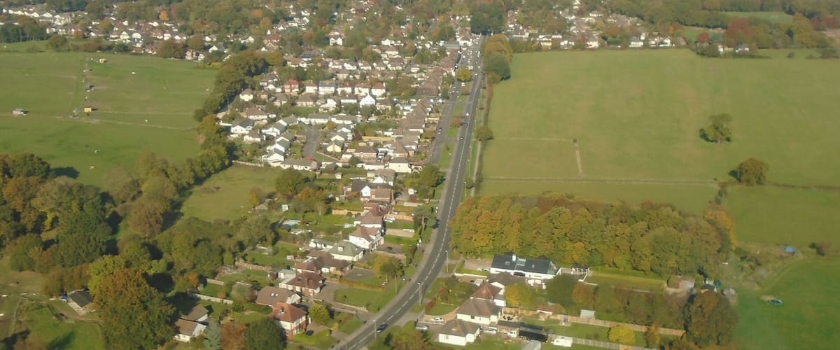 Looking northwards along New Road towards Parley Cross