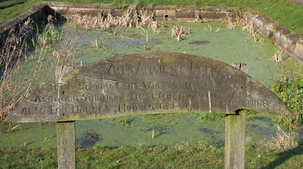 Village pond at Glaston The hand carved inscription on this wooden sign says: "An ancient pond circa 1740 for soaking cart wheels to prevent ash wood shrinking from the iron tyres and also for horses hooves to prevent hardening"