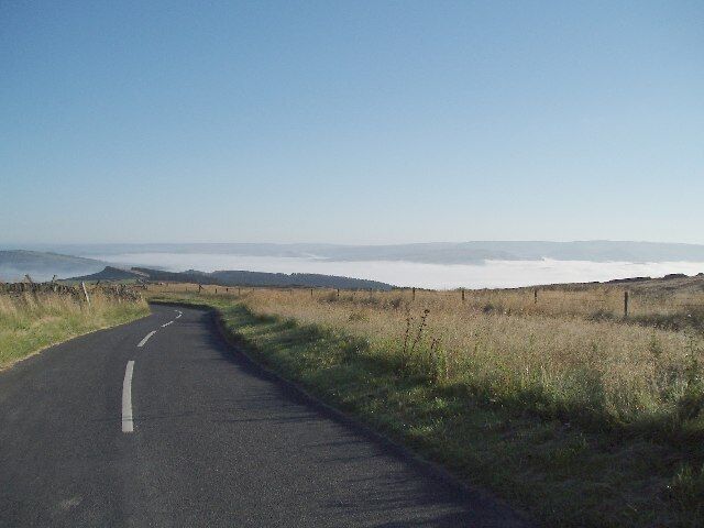 Looking north from near Pym Chair ,Windgather Rocks and Goyt Forest in middle distance. Taken 7.00 am. Pym Chair is approx 200mtrs to the east, the morning mist covering Whaley Bridge to the north and Chapel en le Frith to the east