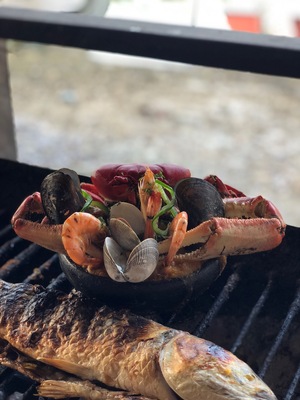 #GoodEats Cazuela de Mariscos. The perfect seafood mix in a bowl with plantains and peanut sauce. This photo was taken in the small town of El Morro, Guayas Ecuador. By the way, the fish was good too, but hands down to the Cazuela, a must try if you are in the area.