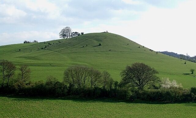 Cymbeline's Castle from Ellesborough Church Tower. On a beautiful Bank Holiday Monday (for a change !), we climbed to the top of the fine tower of 282314 which affords excellent views in all directions.To the southwest the scene is dominated by this notable tump. It is an ancient Motte & Bailey system known as Cymbeline's Castle (or Mount). Any connection with the ancient British king - whom Shakespeare wrote a play about - is I think speculative at best. However it has been suggested that the nearby Kimbles (Little & Great) are named after him, so it does at least have some plausible link back to pre-Roman times. Although Shakespeare used the name Cymbeline (for his entirely fictional tale), this 1st Century king who ruled a large area of Southern England before the Roman invasion, is more generally known historically as Cunobelinus, though he is known also by various other names such as Cynfelyn and Kymbelinus. This little mount on which his putative castle stood sits below the higher eminence of Beacon Hill, but manages not to be overshadowed by it, retaining a certain quality - perhaps due to its ancient history.
