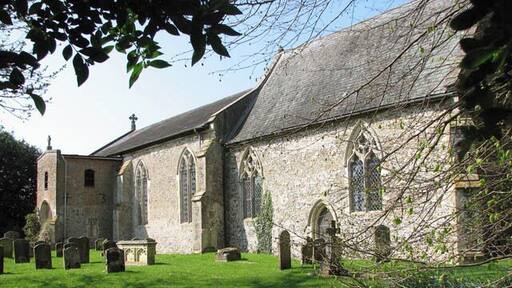 St Mary's church. St Mary's church > 1263635 - 1263650 is tucked away on the edge of the village, located off the narrow Station Road and linked with it by an unsurface lane which is even narrower. The church can't be seen from a distance because there is no church tower giving away its location. Restored in Victorian times, there still is the original 13th century doorway, and the square font > 1263655 dates from Norman times. The royal arms to George III > 1263638 are described as being some of the finest in the county; a couple of medieval bench ends > 1263648 are adorned with carved figures and animals and the nave roof is of arch-braced hammerbeam construction. The church is open every day - if you can find it.