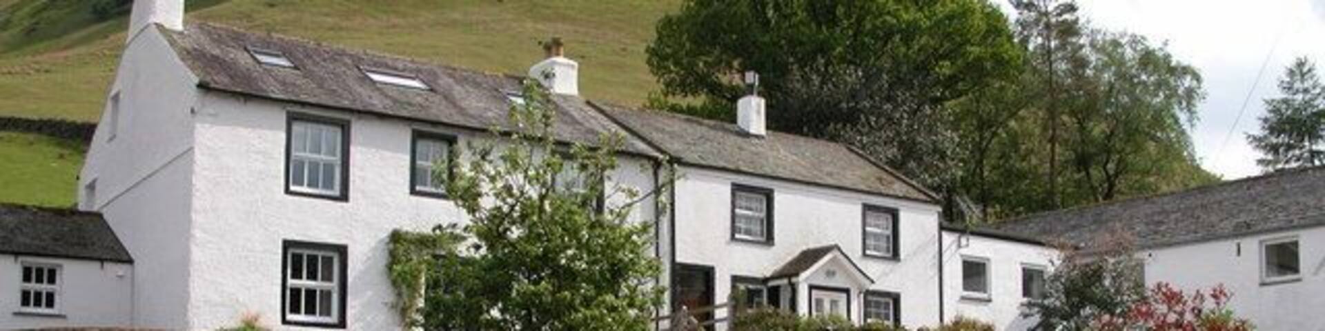 Cottages in Little Town. Cottages with High Crags behind.