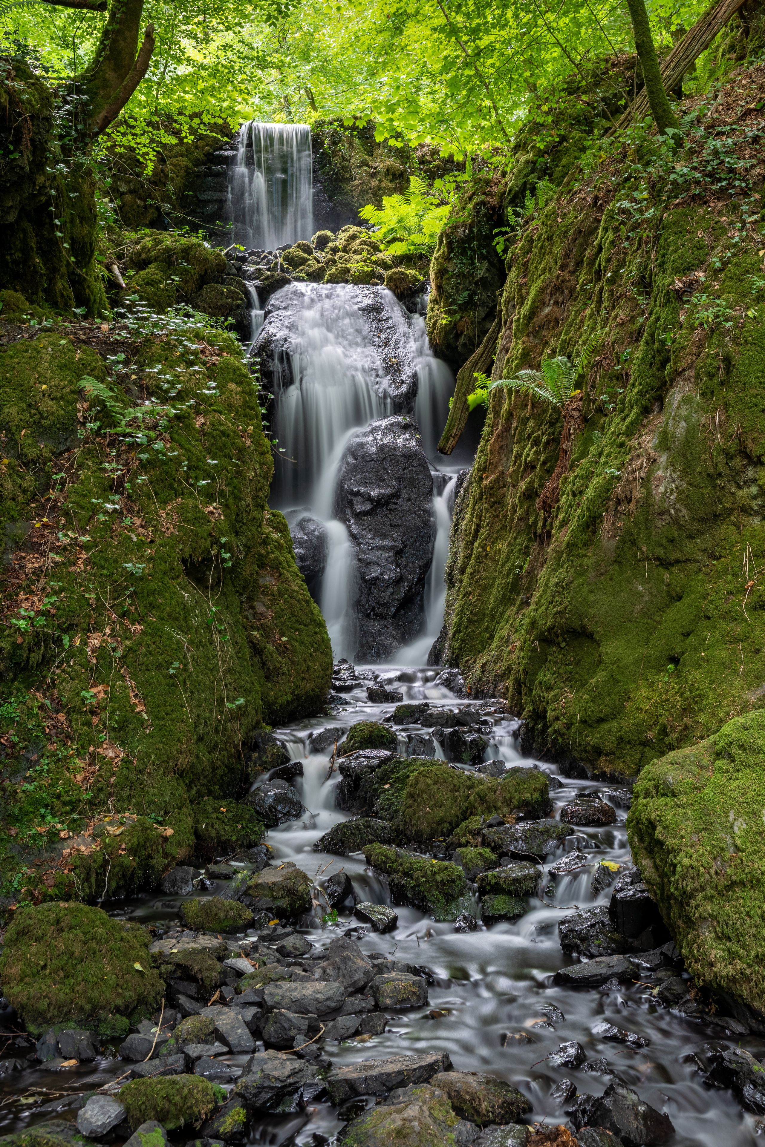 Long exposure Clampitt Falls waterfall at Canonteign Falls in Dartmoor