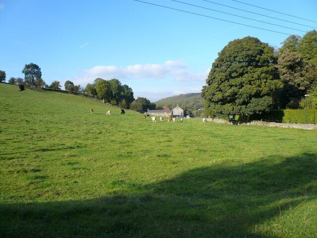 View across fields of Farm with Bell Tower