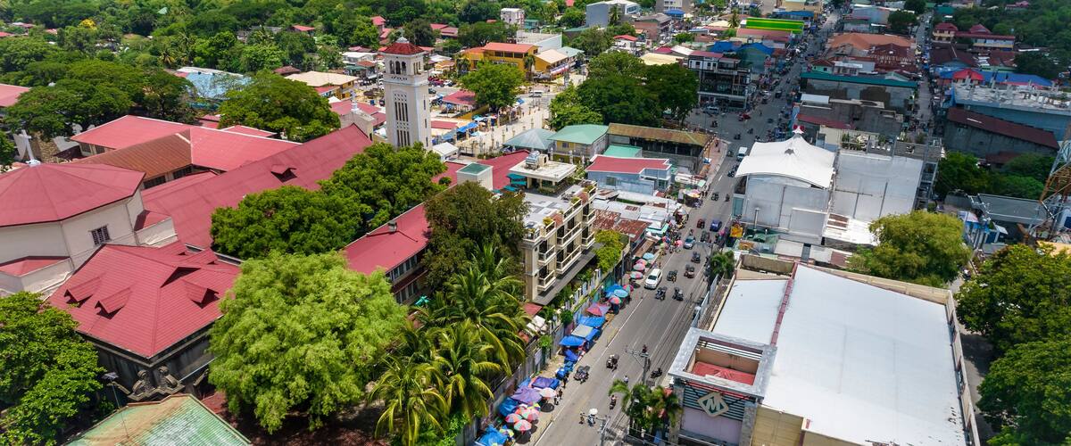 Manaoag, Pangasinan, Philippines - Aerial of the town proper and the The Minor Basilica of Our Lady of the Rosary.
