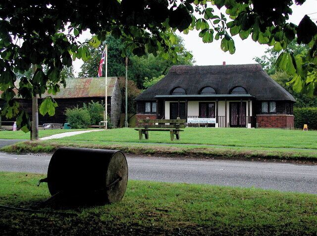 Eltisley Cricket Club. The thatched pavilion of Eltisley Cricket Club, seen from under a huge chestnut tree by the cricket pitch on the village green.