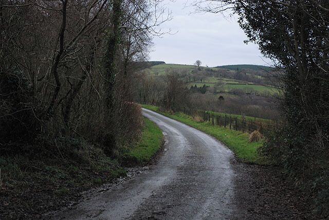 Minor road heading for Rhydcymerau Generally narrow, and fairly muddy in this weather.