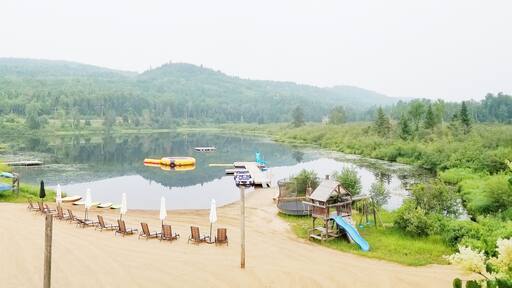 Lanaudière region Quebec staying at #aubergeduvieuxmoulin - a rural family-owned oasis with fun for all ages (including an outdoor spa & water trampoline)