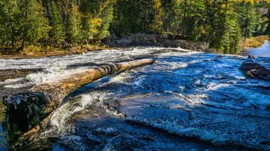View on the Calvaire waterfall, a serie of small cascades located in Lanaudiere region of Quebec, Canada