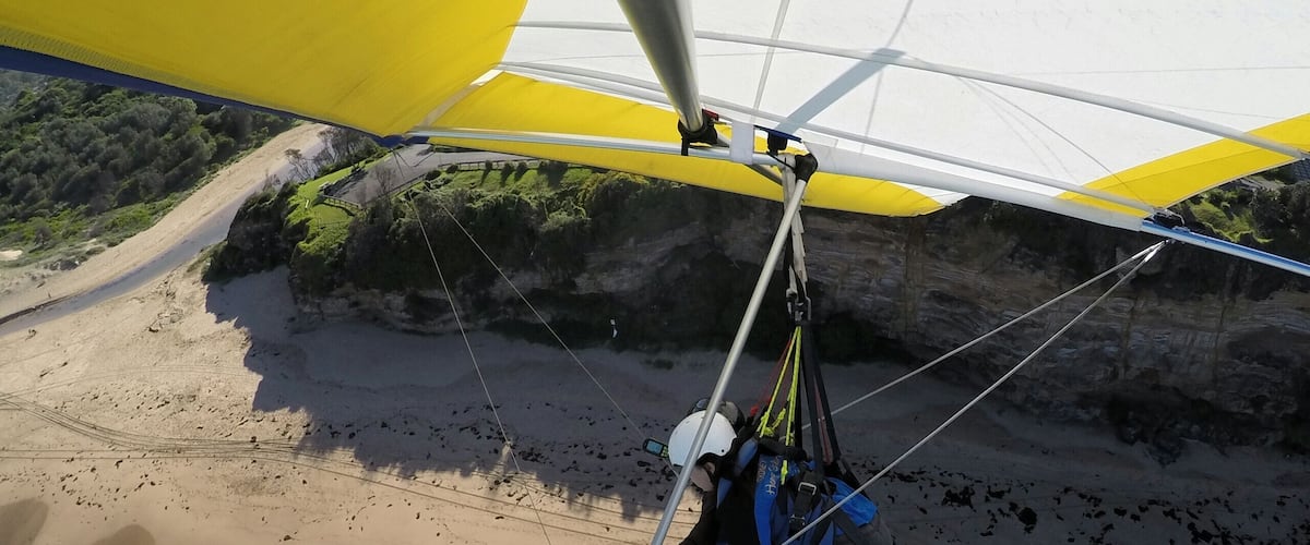 Getting ready for landing after a long flight! What's better than flying like a bird in the sky? Don't worry if you have never hang glide before. A professional glider will be controlling the glide and all you have to do is to run at full speed, jump off the cliff (?!) and enjoy the flight. If you are lucky like me, you get to take control for a while too.
#LifeAtExpedia #beach #hanggliding