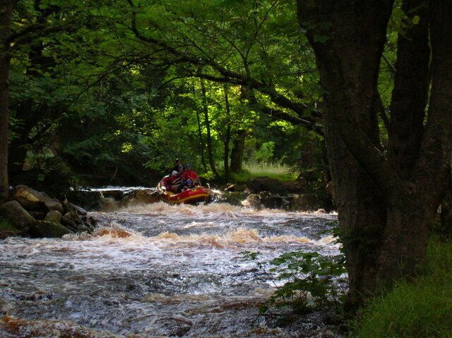 Rafters on Washburn weir Coming over the larger of the weirs on the Washburn during a reservoir release. The water is regularly released from the higher reservoirs into ones further downstream, and people can pay to take advantage of the water mainly in kayaks or rafts.