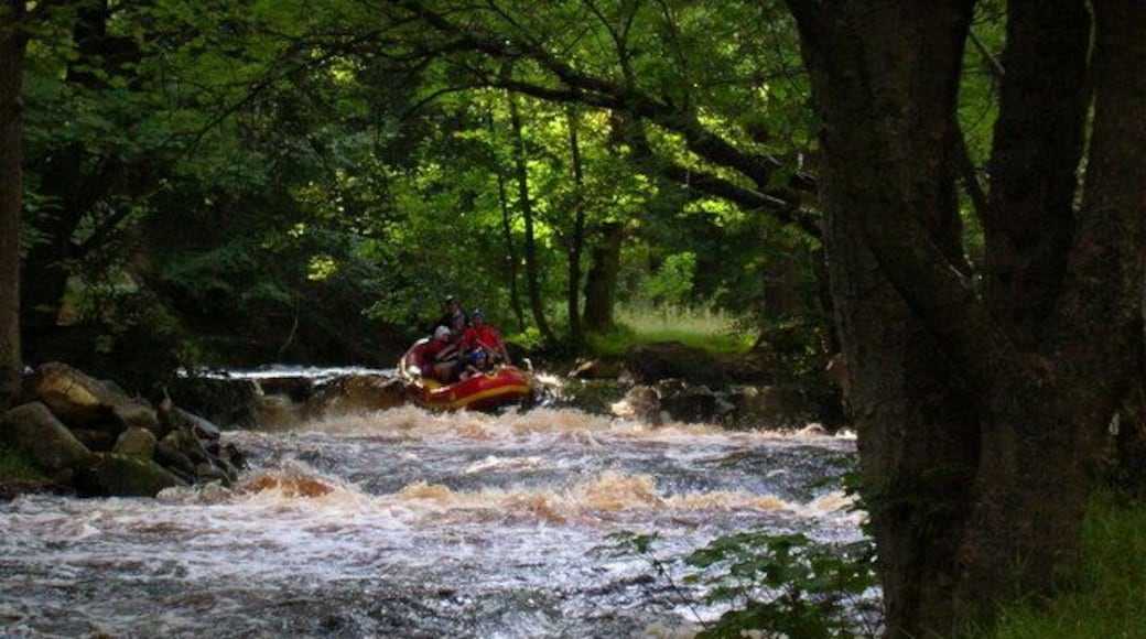 Rafters on Washburn weir Coming over the larger of the weirs on the Washburn during a reservoir release. The water is regularly released from the higher reservoirs into ones further downstream, and people can pay to take advantage of the water mainly in kayaks or rafts.