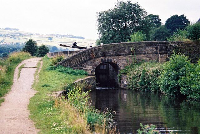 Lock No 16E, Huddersfield Narrow Canal The name of this lock is Wearwood Lower Lock; the bridge carries the very minor Ramsden Mill Lane.