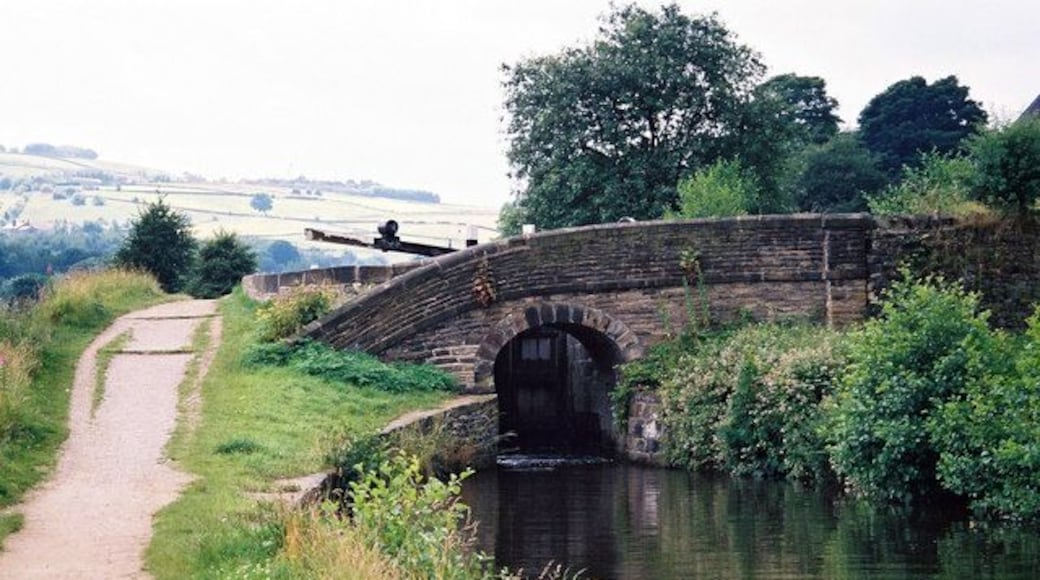 Lock No 16E, Huddersfield Narrow Canal The name of this lock is Wearwood Lower Lock; the bridge carries the very minor Ramsden Mill Lane.