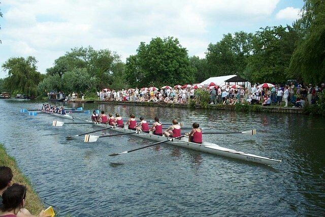 Cambridge - May Bumps Yes - they are held in June - the boats start equally spaced down the river. When the bow of one nudges the stern of one in front, the front boat has been "bumped" and the two boats exchange places in the following heat.