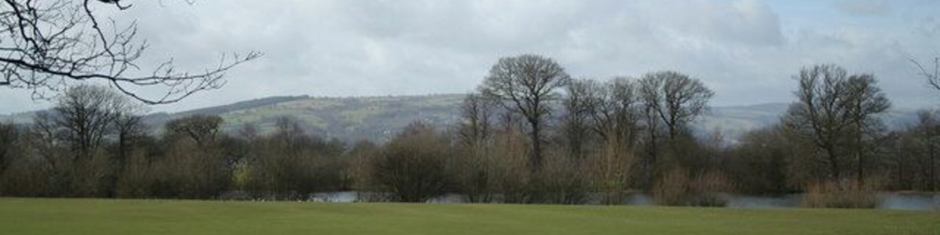 Distant Hills This view to the Welsh Mountains takes in the lake at Wynnstay Hall, but sadly fishing not allowed.