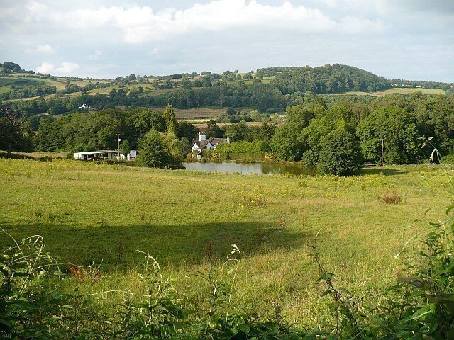 View across the Rhymney Valley The wooded hill at the upper right is Coed Mawr ST2488.