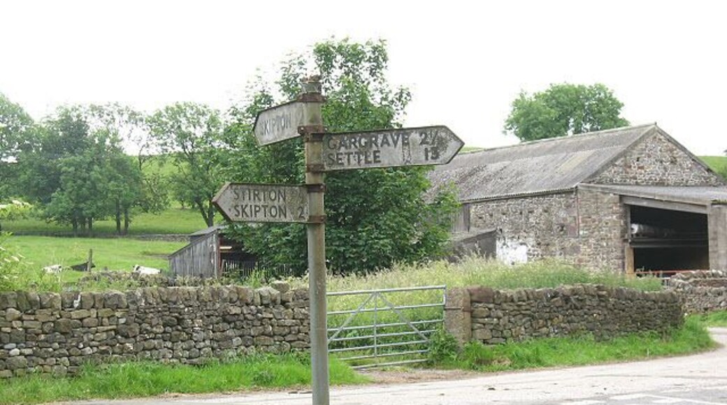 Old signpost at Thorlby. This sturdy old metal signpost could do with a good clean! For a wider context see 119732.