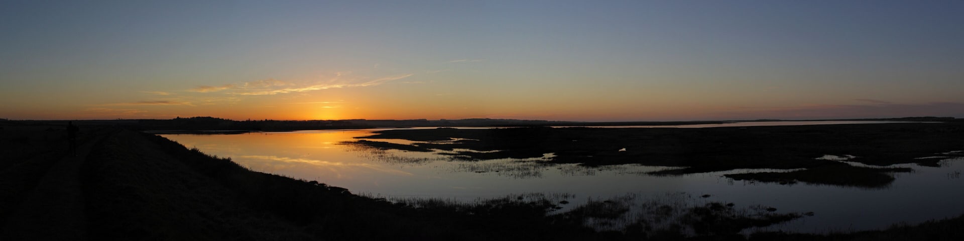 Sunset over the Burnham Overy Staithe Estuary. Peter Neaum.