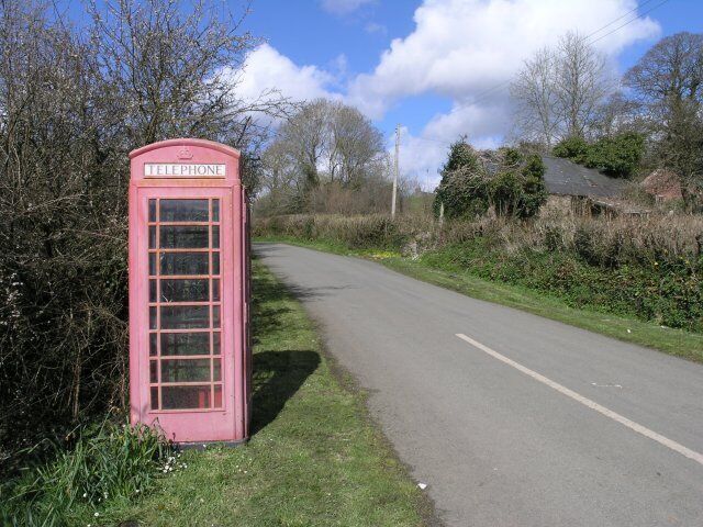Telephone kiosk in Cresswell Quay The paintwork on the kiosk really was a bit jaded making this more of a pink phone box rather than red! Inside, it seemed to be a monumental battle between trapped flies and the spiders who must have thought they'd died and gone to heaven...