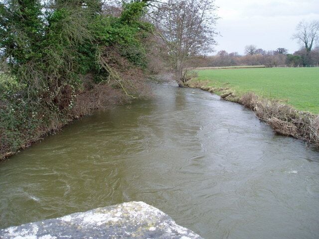 Afon Clywedog. The river Clywedog, north-east of Llanynys, nearly full to bursting.