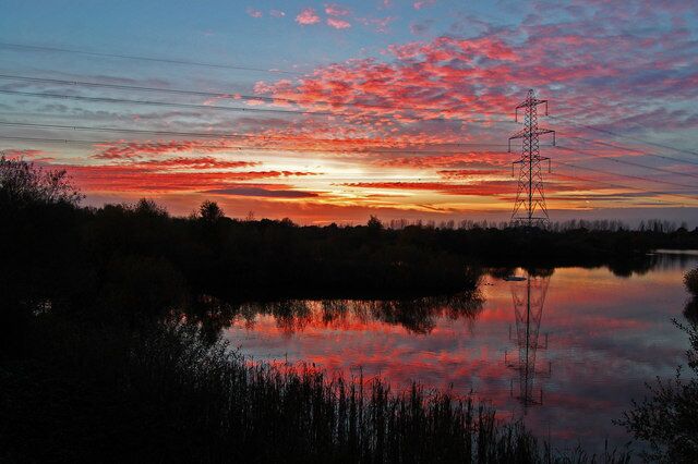 Sunset over Whisby Nature Park. I took this photo this afternoon at sunset from the balcony of the cafe at the Whisby Visitor Centre. This is a beautiful area, shame about the major power lines crossing it!