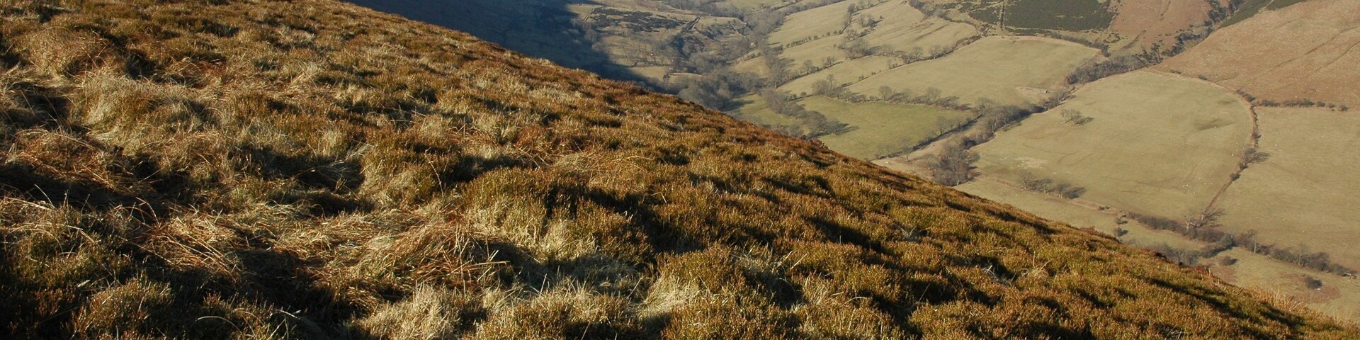 Gospel Pass viewed from Darren Lwyd The road from Capel-y-ffin to Hay-on-Wye passes up this valley and crosses the Gospel Pass at the top. Ffynnion y Parc is at the head of the valley.