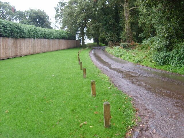 Passing Hunters Lodge The Monarch's Way follows Sandy Lane near Blakedown.