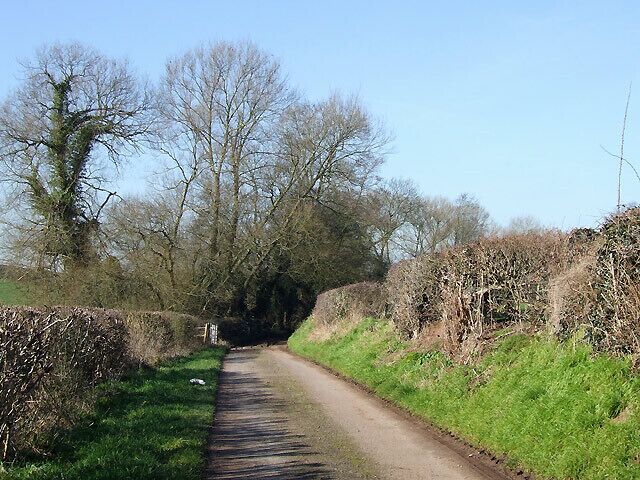 Pleasant Country Lane to Upper Aston, Shropshire Huh!! After the ford, the lane towards and past Lower Aston Farm is the muddiest public surfaced road I've been on for a long time!