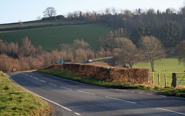 A490 Climb The A490 heading towards Welshpool climbs towards the 160 metre wooded escarpment that is home to a caravan park at its peak.