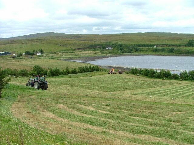 Cutting silage at Feorlig Overlooking Loch Caroy.