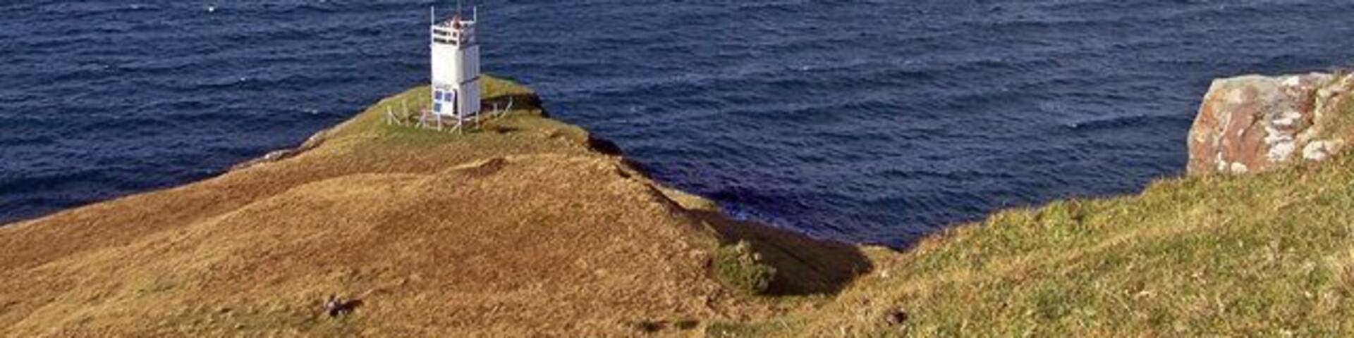 Uiginish Point A small navigation light stands at the Point, facing north over Loch Dunvegan.