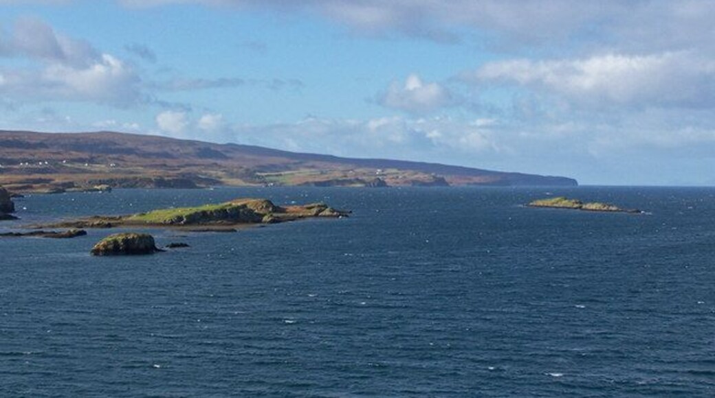Islands in Loch Dunvegan Viewed from a high point just south of Uiginish Point, looking north west towards the Duirinish peninsula which ends at Dunvegan Head. The islands are (closest) Stac na Bearta (mostly in square NG2348), beyond it is Garay Island, and on the right Eilean Grianal.