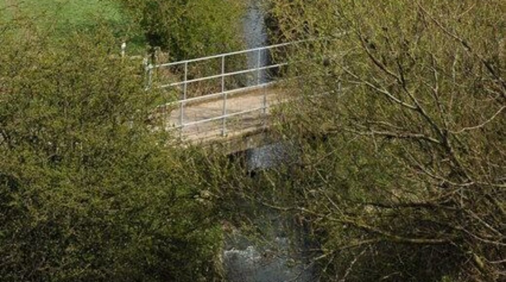 Carrant Brook, near Northway Mill The Carrant Brook near Northway Mill, viewed from a bridge over the M5 motorway.