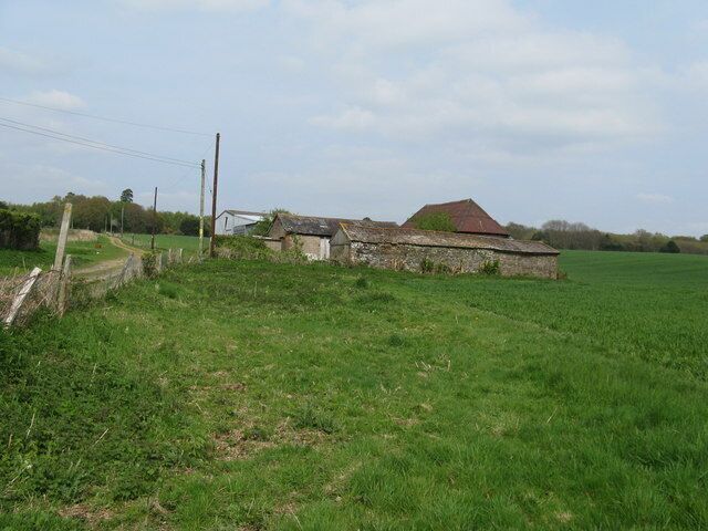 Four different ages and construction of barns on footpath to Brinkshole Heath