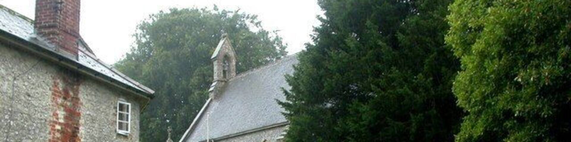 Ashmore, St Nicholas Parish church, mainly C19 restored, with an arch that might be C13. As seen on a wet summer's day. English Heritage-listed, http://www.imagesofengland.org.uk/Details/Default.aspx?id=102850&mode=adv