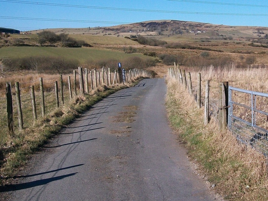 The Bryncir end of the Llecheiddior-uchaf farm road This farm road is part of cycle route 8.