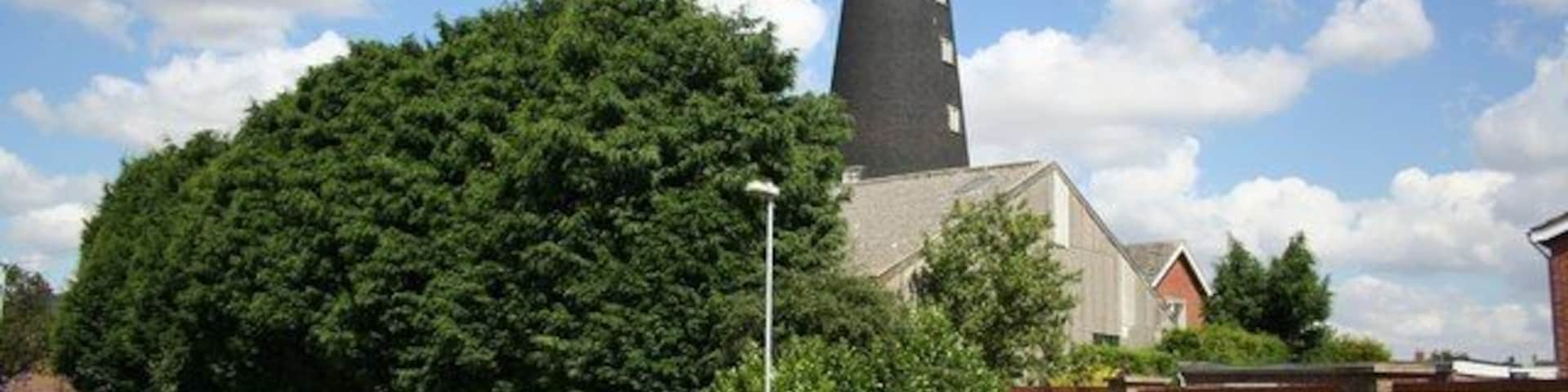 Wragby Mill Six storey tower mill built in 1831, now surrounded by modern housing. Its 6 sails worked until 1906 and milled by oil engine power for some time afterwards.