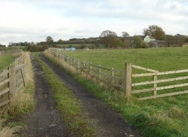 The track to Whisgills Presumably named after the original owner, although it is not obviously a local name.