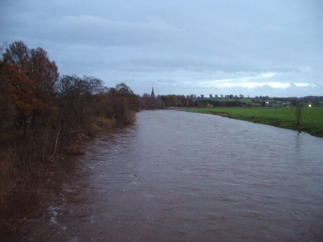 River Eden Looking up stream from Warwick Bridge, the church in the distance is St Paul Church, Holme Eden