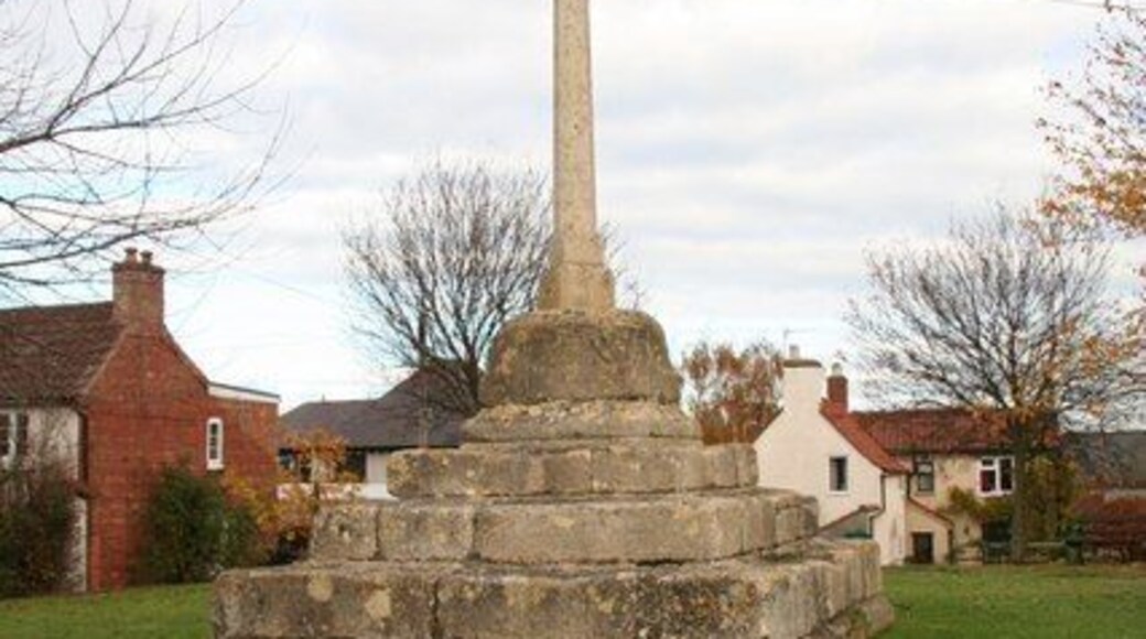 Stone cross on the green in Muston, Leicestershire