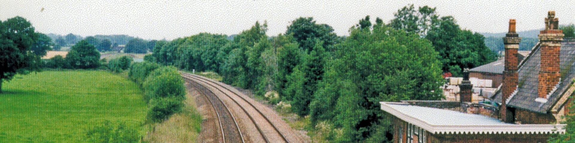 Hadnall: former station, 1998. View northward, towards Whitchurch and Crewe: ex-LNWR Crewe - Shrewsbury main line. The station was closed to passengers 2/5/60 (to goods 2/11/64), but the line remains as the North - West through route