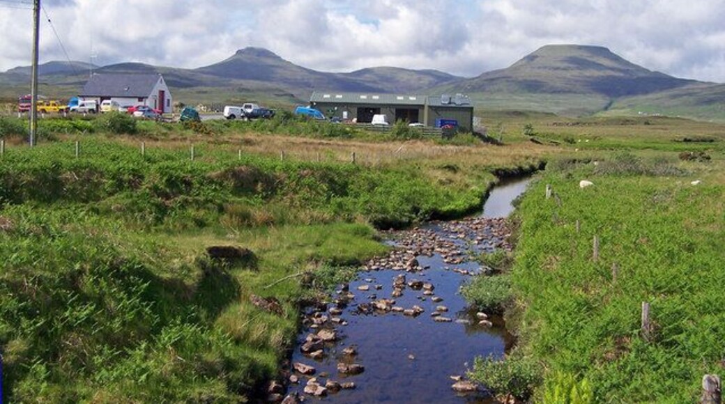 River Horneval, Lonmore The white building on the left is the Fire Station, and the green shed is a garage workshop - strangely set in a very rural location with MacLeod's Tables in the background.