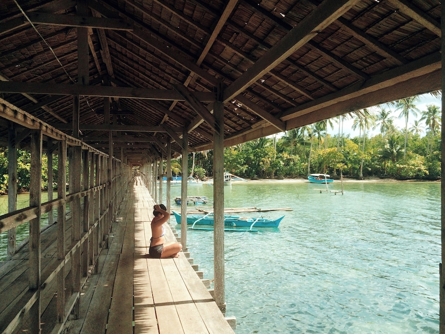 This long dock leads to the resort and passes over mangroves on the island. It's perfect to just sit and enjoy the sunshine. #BeachTips
More photos, a guide, and tips for this destination here:
http://artbeatsmath.com/surigao-siargao