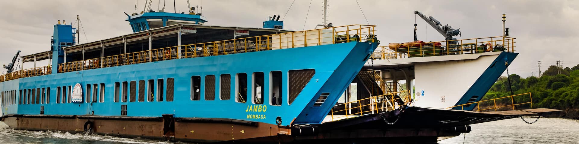 Africa Kenya. A ferry in the city of Mombasa. People go to work. Ferry crossing in Kenya. 05.01.2006