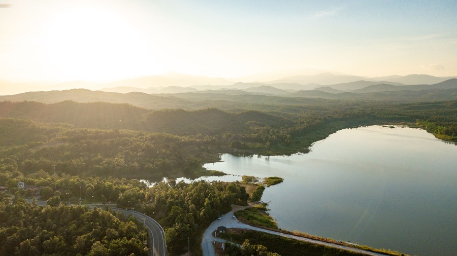 Pong Chor Reservoir in Mae Wang National Park Chiang Mai, Thailand. Photo in aerial view by drone with beautiful nature. Abstract of peaceful, peace wallpaper background.