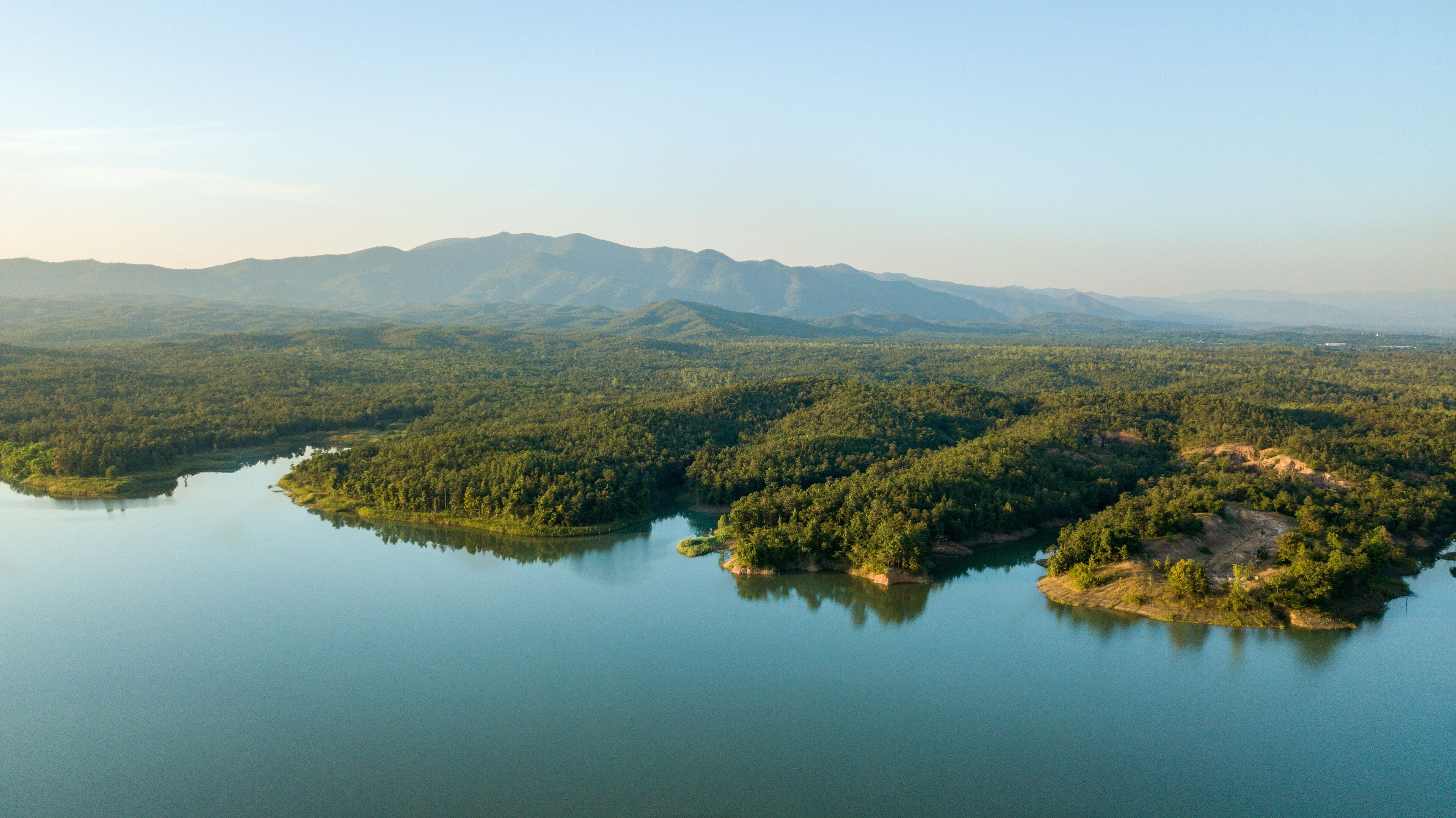 Pong Chor Reservoir in Mae Wang National Park Chiang Mai, Thailand. Photo in aerial view by drone with beautiful nature.  Abstract of peaceful, peace wallpaper background.
