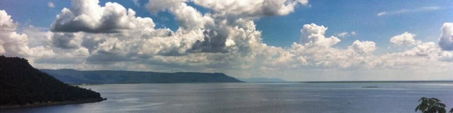 Ubolratana Dam is a great day trip from Udon Thani or Khon Kaen. Here you will find great views of the lake, delicious isaan food and a large, white Buddha at the top of a hill overlooking the dam. It's worth a visit!
For more info on Ubolrat Dam or Khon Kaen, please visit http://thetradingtravelers.com/8-things-to-do-khon-kaen-thailand/